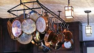 Lillico proudly hangs his copper pots in the centre of the kitchen.